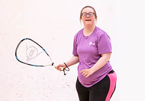 Girl playing squash 57 on court